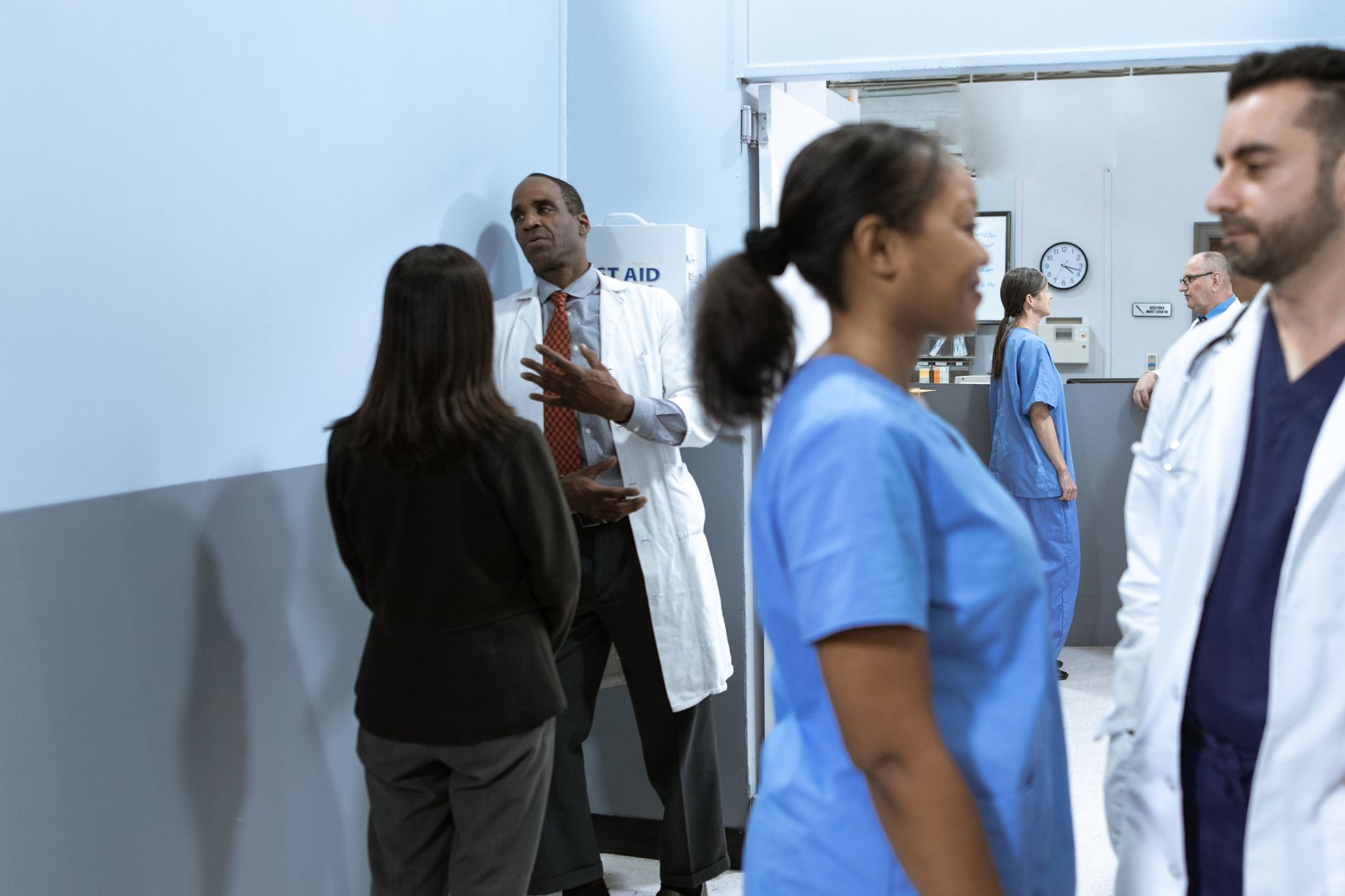 medical practitioners having a discussion